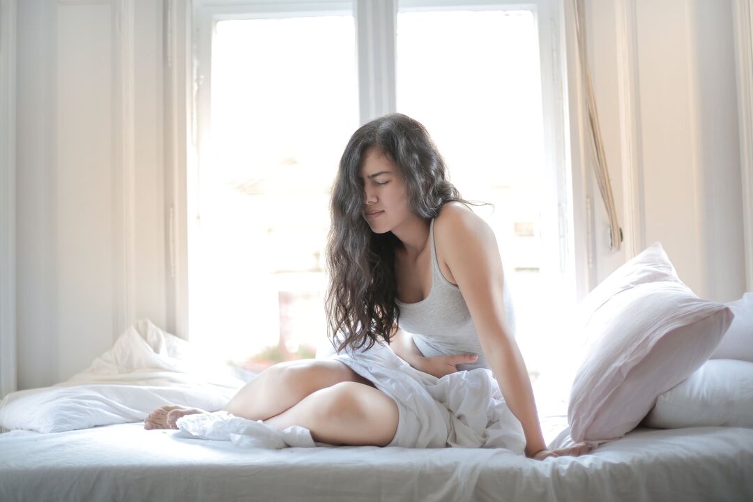 Symptomer vun Cystitis bei Fraen